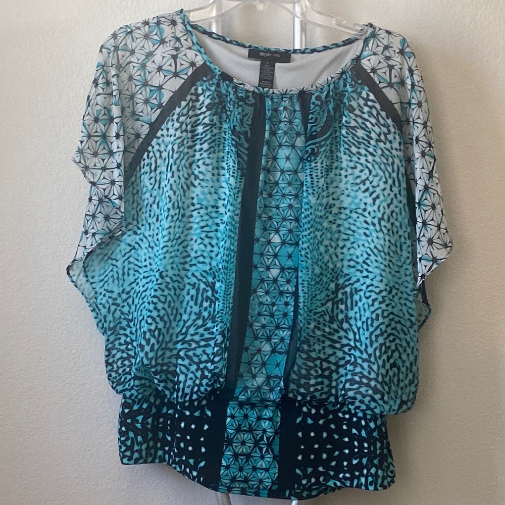 Style&CO Body: 100% polyester Lining: 100% polyester bottom: 95% poly 5% span